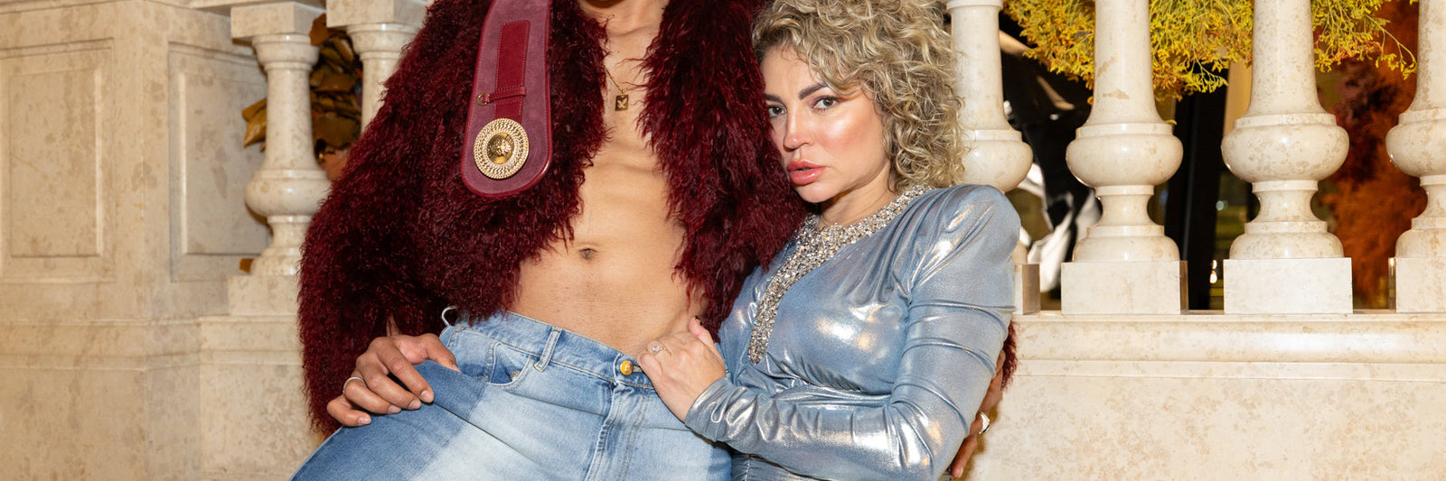 Flash photography photo of a woman wearing cool pants and a hat and nothing else.